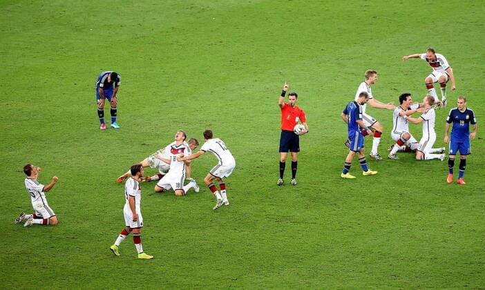 Philipp Lahm, Toni Kroos, Referee Nicola Rizzoli, Per Mertesacker, Mats Hummels, Andre Schürrle, Benedikt Höwedes Germany s players celebrate the victory after the final match between Germany and Argentina of 2014 FIFA World Cup at the Estadio do Maracana Stadium in Rio de Janeiro, on July 13, 2014. 