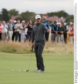 England s Justin Rose on the 17th green on the final practice day before the 2014 Open Golf Championships in Hoylake on July 16, 2014.  LON2014071614