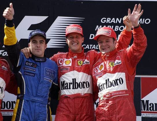 SCHUMACHER Michael Sieger Grand Prix von Spanien mit Fernando Alonso und Rubens Barrichello Scuderia Ferrari Marlboro F -1 Team Grand Prix von Spanien in Barcelona 2003.Sport Motorsport Formel1 Siegeehrung. Copyright 