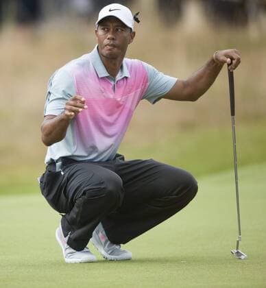 19.07.2014. Hoylake, England. The Open Golf Championship, Round 3. Tiger WOODS USA waiting for his ball return from caddie on the greem xStephenxBartholomewx  ActionPlus5919