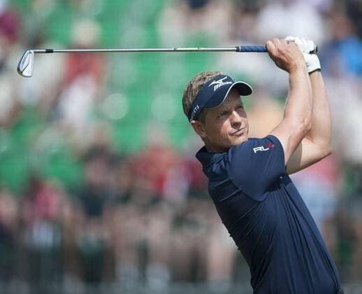 20.07.2014. Hoylake, England. The Open Golf Championship, Final Round. Luke DONALD ENG watches his approach to the green xStephenxBartholomewx  ActionPlus97377168