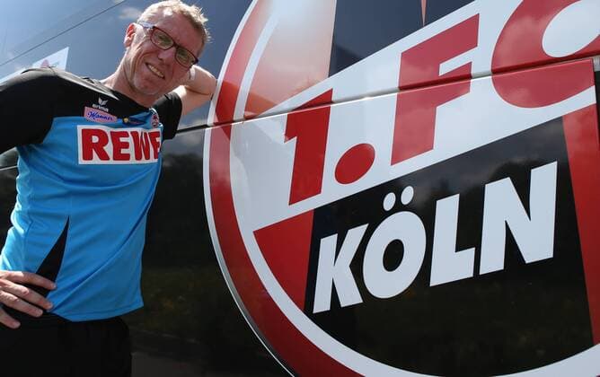 SOCCER - Peter Stöger, photo shoot SOELL,AUSTRIA,25.JUL.14 - SOCCER - DFL, 1. Deutsche Bundesliga, 1. FC Köln, photo shooting with Peter Stöger. Image shows head coach Peter Stöger (Köln). Keywords: logo. 