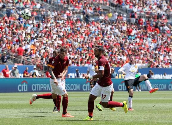 Manchester United s Wayne Rooney scoring his sides opening goal - International Champions Cup 2014 - AS Roma v Manchester United - Sports Authority Field - Denver - USA - 26th July 2014 - Picture David Klein Sportimage EDITORIAL USE ONLY. No use with unauthorised audio, video, data, fixture lists, club league logos or live services. Online in-match use limited to 120 images, no video emulation. No use in betting, games or single club league player publications.