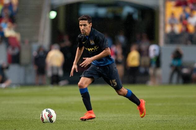 July 27 2014: Manchester City midfielder Jesus Navas (15) makes a play with the ball during the first half of the International Champions Cup soccer match between Manchester City and AC Milan at Heinz Field in Pittsburgh, Pennsylvania. SOCCER: JUL 27 International Champions Cup - Manchester City v AC Milan Icon14072743 EDITORIAL USE ONLY