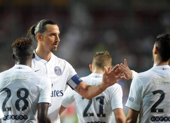 Zlatan Ibrahimovic (2nd L) of Paris Saint-Germain (PSG) celebrates a goal during a friendly match against Kitchee SC of Hong Kong in Hong Kong. July 29, 2014. (Xinhua LoxPing Fai) (SP) -FOOTBALL-FREINDLY 