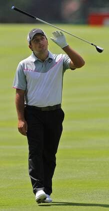 July 31, 2014 - Akron, OH, USA - Francesco Molinari tosses his club in the air after hitting an errant second shot on the 13th hole during the first round in the WGC-Bridgestone Invitational at Firestone Country Club in Akron, Ohio, on Thursday, July 31, 2014. WGC-Bridgestone Invitational, first round - ZUMAm67