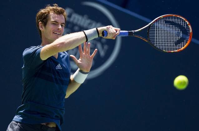 Andrew Andrew - Andy - Murray of Britain returns the ball during the second round of men s singles at the 2014 Rogers Cup in Toronto, Canada, Aug. 6, 2014. CANADA-TORONTO-TENNIS-ROGERS CUP-MEN S SINGLES ZouxZheng 