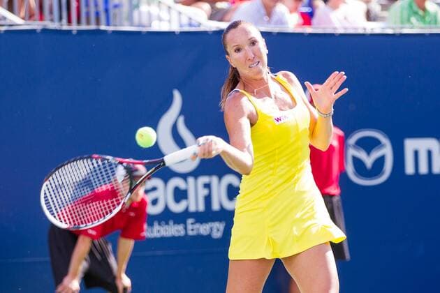 AUG 06, 2014 : Jelena Jankovic (SRB) hits the ball during her game in the 2nd round of the Rogers Cup presented by National Bank at Uniprix Stadium in Montreal, Quebec, Canada. TENNIS: AUG 06 Rogers Cup - woman Montreal Icon14080627 EDITORIAL USE ONLY