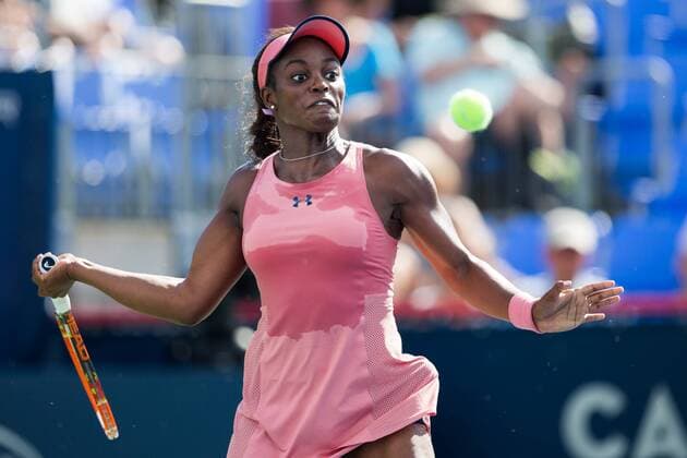 AUG 06, 2014 : Sloane Stephens (USA) returns the ball during her game in the 2nd round of the Rogers Cup presented by National Bank at Uniprix Stadium in Montreal, Quebec, Canada. TENNIS: AUG 06 Rogers Cup - woman Montreal Icon14080635 EDITORIAL USE ONLY
