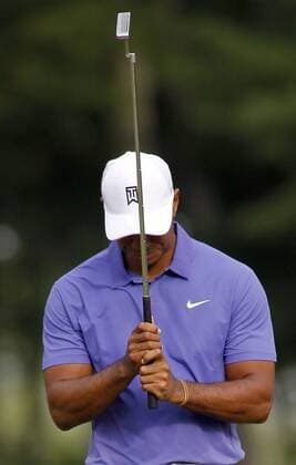Tiger Woods reacts to a missed birdie putt on the 11th hole during the first round of the 96th PGA Golf Herren Championship at Valhalla Country Club on August 7, 2014 in Louisville, Kentucky.  LOU2014080705
