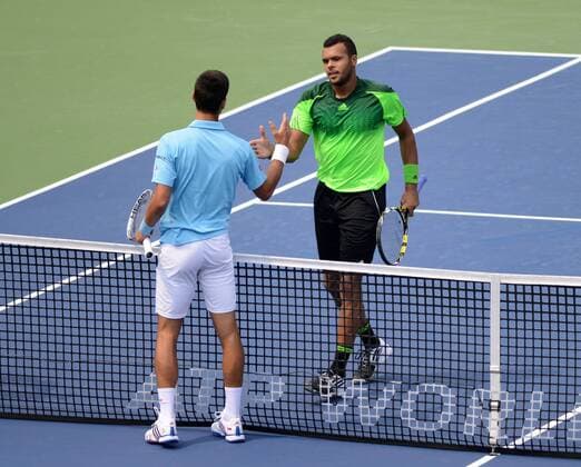 L-R, Novak Djokovic (SRB) gratuliert Jo-Wilfried Tsonga (FRA) am Netz. Rogers Cup 2014, Toronto, Canada