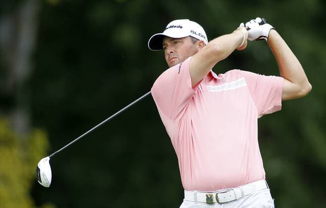 Ryan Palmer, of the United States, watches his tee shot on the fifth hole during the first round of the 96th PGA Golf Herren Championship at Valhalla Country Club on .August 7, 2014 in Louisville, Kentucky. Westwood sank the birdie to shoot a six-under 65 and currently has a one stroke lead.  LOU2014080716