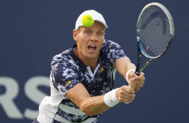 Tomas Berdych of the Czech Republic returns the ball during the third round of men s singles at the 2014 Rogers Cup in Toronto, Canada, Aug. 7, 2014. 