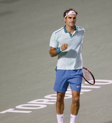 Roger Federer of Switzerland celebrates victory after the third round of men s singles at the 2014 Rogers Cup in Toronto, Canada, Aug. 7, 2014. 