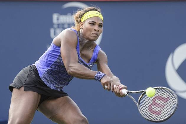 07 August 2014: Serena Williams of the United States hits a return during the third round of the Rogers Cup Presented by National Bank at Uniprix Stadium in Montreal, Quebec, Canada. Icon10609 EDITORIAL USE ONLY