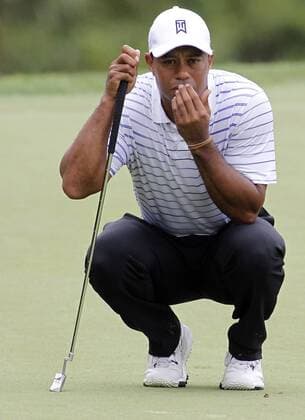 Tiger Woods, of the United States, lines up a putt on the third green during the second round of the 96th PGA Golf Herren Championship at Valhalla Country Club on .August 8, 2014 in Louisville, Kentucky.  LOU2014080809