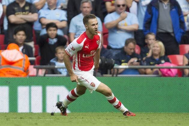 Arsenal s Aaron Ramsey celebrates scoring his sides second goal - Arsenal vs. Manchester City - The FA Community Shield - Wembley Stadium - London - 10 08 2014 Pic Philip Oldham Sportimage EDITORIAL USE ONLY. No use with unauthorised audio, video, data, fixture lists, club league logos or live services. Online in-match use limited to 120 images, no video emulation. No use in betting, games or single club league player publications.