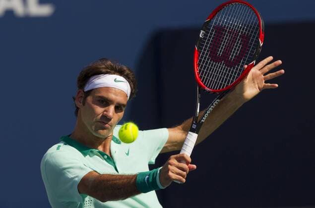 (140811) -- TORONTO, Aug. 10, 2014 -- Roger Federer of Switzerland returns the ball during the final of men s singles Rogers Cup 