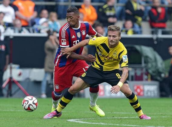 13.08.2014, xovx, Fussball Supercup, Borussia Dortmund - FC Bayern München, v.l. Jerome Boateng (FC Bayern München), Ciro Immobile (Borussia Dortmund), Aktion.