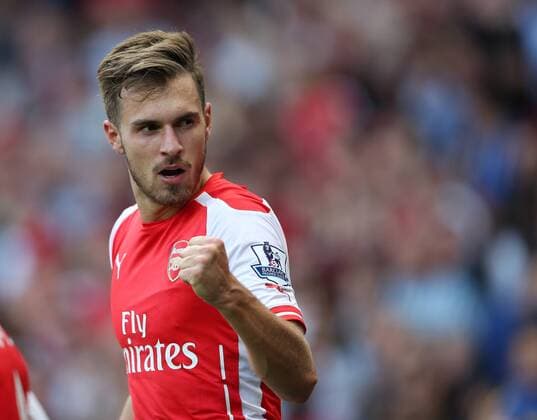 Arsenal s Aaron Ramsey celebrates scoring his sides second goal - Barclays Premier League - Arsenal vs Crystal Palace - Emirates Stadium - London - England - 16th August 2014 - Picture David Klein Sportimage EDITORIAL USE ONLY. No use with unauthorised audio, video, data, fixture lists, club league logos or live services. Online in-match use limited to 120 images, no video emulation. No use in betting, games or single club league player publications.
