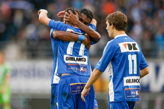 20140817 - GENT, BELGIUM: Gent s Danijel Milicevic (C) celebrates with his teammates after scoring during the Jupiler Pro League match between KAA Gent and Zulte Waregem, in Gent, Sunday 17 August 2014, on day 4 of the Belgian soccer championship. BRUNOxFAHY 04280132