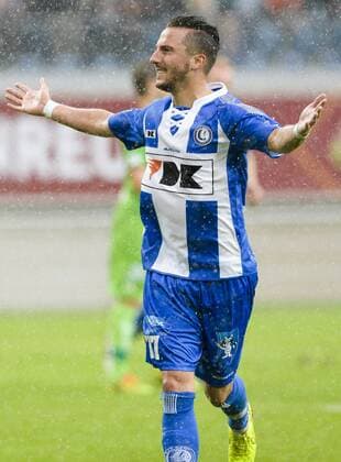 20140817 - GENT, BELGIUM: Gent s Danijel Milicevic celebrates after scoring during the Jupiler Pro League match between KAA Gent and Zulte Waregem, in Gent, Sunday 17 August 2014, on day 4 of the Belgian soccer championship. LAURIExDIEFFEMBACQ 04280375