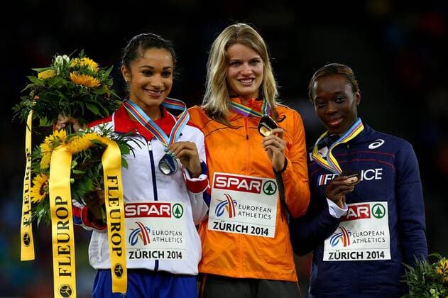 Silver medalist Jodie Williams of Great Britain and Northern Ireland, gold medalist Dafne Schippers of the Netherlands and bronze medalist Myriam Soumare of France Podium ATHLETICS : European Championships - J6 - Zurich - 17 08 2014 PhotoNews Panoramic 
