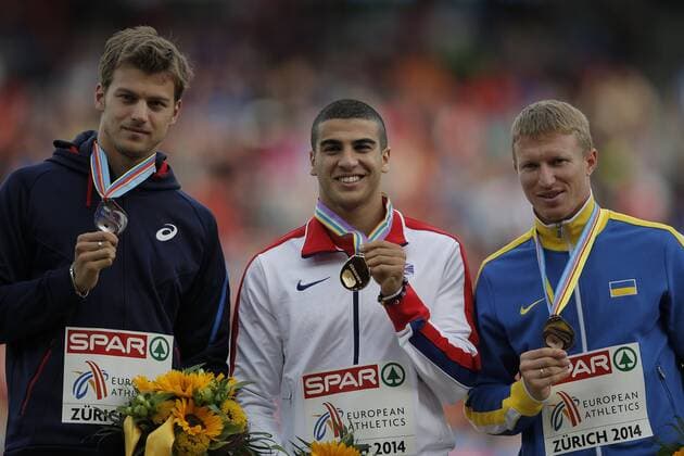 Silver medalist Christophe Lemaitre of France, gold medalist Adam Gemili of Great Britain and Northern Ireland and Serhiy Smelyk of Ukraine celebrate on the podium during the medal ceremony for the Men s 200m ATHLETICS : European Championships - J6 - Zurich - 17 08 2014 PhotoNews Panoramic 