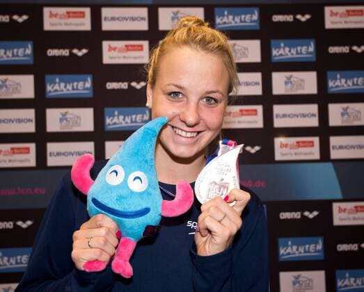 SWIMMING - LEN European championships BERLIN,GERMANY,21.AUG.14 - SWIMMING - LEN European championships, 200m Medley, women. Image shows Lisa Zaiser (AUT) with mascot Drops. Keyword: Medal. 