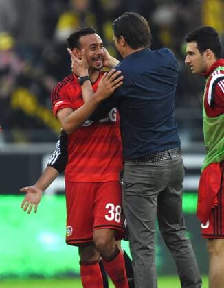 23.08.2014, Fussball, Saison 2014 15, 1. Bundesliga, 1. Spieltag, Borussia Dortmund - Bayer 04 Leverkusen Jubel Trainer Roger Schmidt (Bayer 04 Leverkusen), re., und Karim Bellarabi (Bayer 04 Leverkusen)