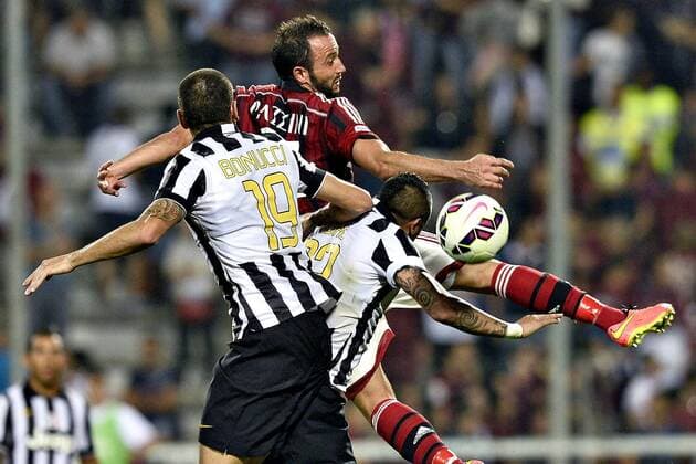 Db Reggio Emilia 23 08 2014 - trofeo Tim Juventus Turin vs AC Mailand: Giampaolo Pazzini-Arturo Vidal-Leonardo Bonucci 