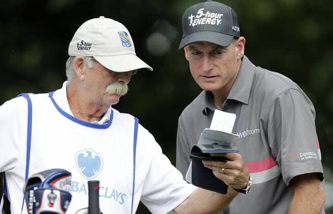 Jim Furyk and Caddie Mike Fluff Cowan stand on the second tee box in the final round at The Barclays at Ridgewood Country Club in Paramus, NJ on August 24, 2014. The Barclays this year returns to the Championship Course at the historic Ridgewood Country Club, site of The Barclays 2008 and 2010 championship.  NYP20140824105