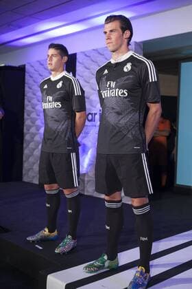James Rodriguez and Gareth Bale during the presentation of the Real Madrid s new Champions League kit at the Santiago Bernabeu stadium in Madrid, Spain. May 26, 2013.  (2014082621023)