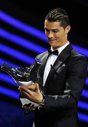 Aug. 28, 2014 - Monte Carlo, Monaco - The Portuguese soccer player of Real Madrid CF CRISTIANO RONALDO, with his trophy after he was chosen the best soccer player of Europe 2014 during the UEFA Champions League 2014 - 15 Draw at Grimaldi Forum. Soccer 2014 - UEFA Champions League 2014 - 15 Draw.  - ZUMAm11