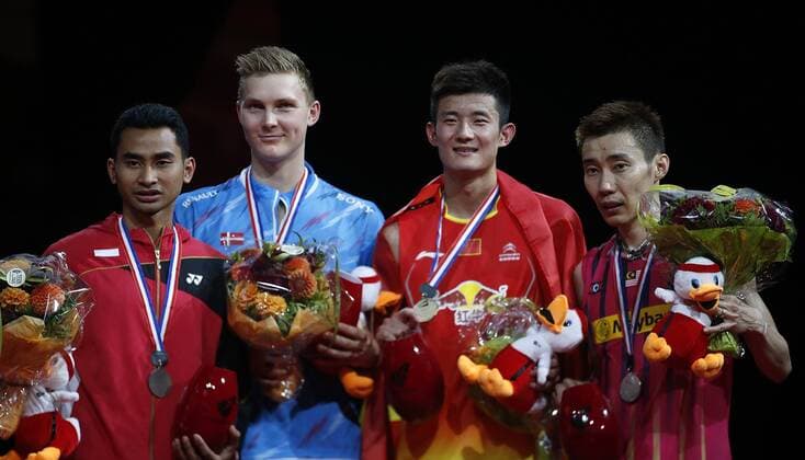 COPENHAGEN -- (From L to R) Tommy Sugiarto of Indonesia, Viktor Axelsen of Denmark, Chen Long of China and Lee Chong Wei of Malaysia pose during the awarding ceremony for the Men s Singles Final on Day 7 of Li Ning BWF World Championships 2014 at Ballerup Super Arena in Copenhagen, Denmark on Aug. 31, 2014. 