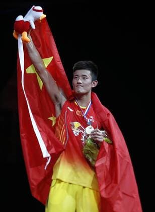 COPENHAGEN -- Chen Long of China celebrates during the awarding ceremony for the Men s Singles Final on Day 7 of Li Ning BWF World Championships 2014 at Ballerup Super Arena in Copenhagen, Denmark on Aug. 31, 2014. 