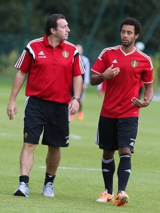20140901 - BRUSSELS, BELGIUM: Belgium s head coach Marc Wilmots and Belgium s Moussa Dembele talk after a training session of Belgian national soccer team Red Devils, Monday 01 September 2014, in Brussels. Belgium will play a friendly match against the Australian national soccer team on Thursday. VIRGINIExLEFOUR  premiumd Highlight 04295506