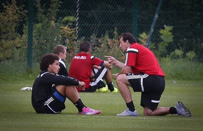 20140901 - BRUSSELS, BELGIUM: Belgium s Axel Witsel and Belgium s head coach Marc Wilmots pictured during a training session of Belgian national soccer team Red Devils, Monday 01 September 2014, in Brussels. Belgium will play a friendly match against the Australian national soccer team on Thursday. VIRGINIExLEFOUR  premiumd Highlight 04295524