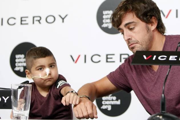 Spanish F1 driver Fernando Alonso presents a solidarity campaign with a child suffering from leukemia in Madrid, Spain. September 02, 2014.  (20299681)