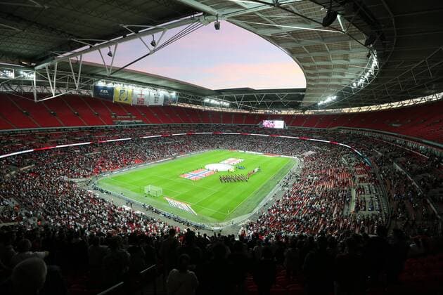A general view of Wembley with plenty of empty seats as the teams line up - International Friendly - England Vs Norway - Wembley Stadium - England - 3rd September 2014 - EDITORIAL USE ONLY. No use with unauthorised audio, video, data, fixture lists, club league logos or live services. Online in-match use limited to 120 images, no video emulation. No use in betting, games or single club league player publications.