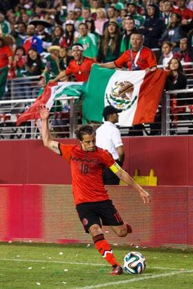 September 06, 2014: Mexico midfielder Andres Guardado (18) takes a corner kick, during the game at Levi s Stadium in Santa Clara. The game ended in a 0-0 draw. SOCCER: SEP 06 Icon20140906056 EDITORIAL USE ONLY