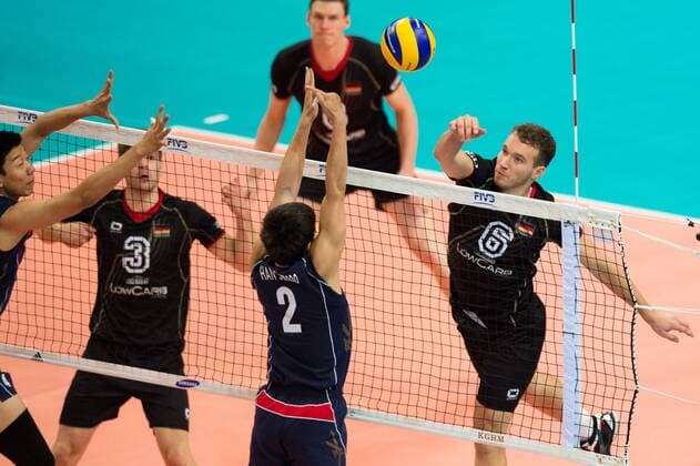 07.09.2014, Spodek, Kattowitz Volleyball, FIVB Volleyball Men s World Championship 2014, Deutschland (GER) vs. Korea (KOR) Block Sun-Soo Han ( 2 KOR) - Angriff Denis Kaliberda ( 6 GER)