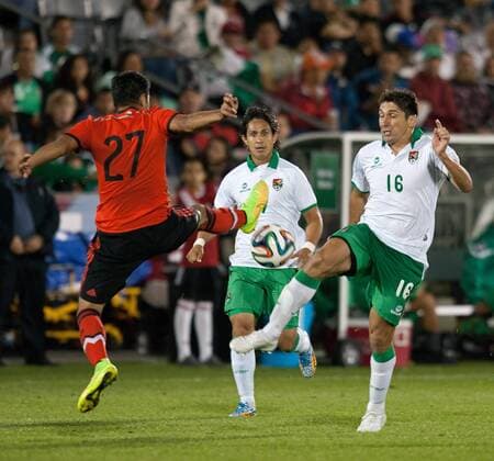 Sept. 9, 2014 - Commerce City, Colorado, U.S - Mexican National Team F JAVIER OROZCO, left, fights for control of the ball with Bolivian National Team D RONALD RALDES, right, during the 1st. half at Dicks Sporting Goods Park Tuesday night . Mexico beats Bolivia 1-0 in an Int l Friendly match. Soccer 2014 - Mexico beats Bolivia 1-0 - ZUMAav4_