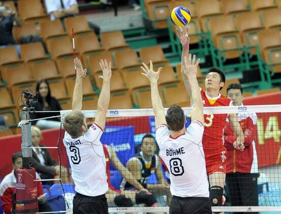 Siatkarzy 2014 FIVB Volleyball Men s World CHAMPIONSHIP 2014. Germany vs. China on September 10, 2014 in Katowice. In the picture: 3 Sebastian Schwarz 8 Marcus Bohme 3 Zhi Yuan  EN_01143552_0840