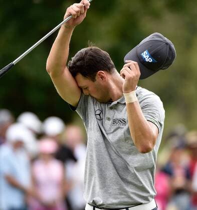 Martin Kaymer wipes his face on No. 2 during the first round of the PGA Golf Herren Tour Championship on September 11, 2014 at East Lake Golf Club in Atlanta. The sport s top players are competing for a chance to win the FedExCup and a $10 million bonus.  AJP2014091110
