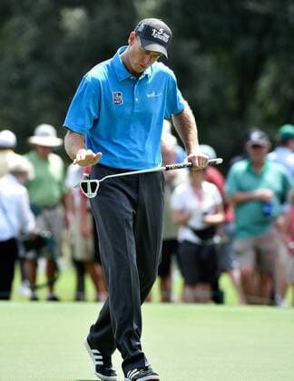 Jim Furyk pats his putter after nearly sinking a birdie putt on No. 2 but he settles for par during the first round of the PGA Golf Herren Tour Championship on September 11, 2014 at East Lake Golf Club in Atlanta. The sport s top players are competing for a chance to win the FedExCup and a $10 million bonus.  AJP2014091115
