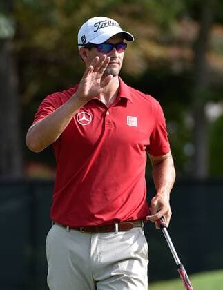 Adam Scott of Australia acknowledges the gallery on No. 2 after a birdie during the second round of the PGA Golf Herren Tour Championship on September 12, 2014, at East Lake Golf Club in Atlanta.  AJP2014091205