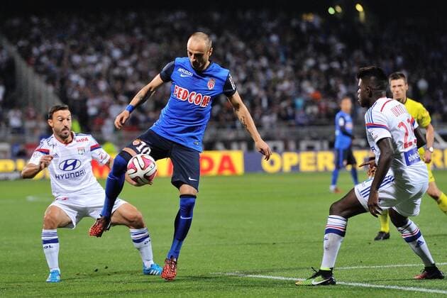Steed Malbranque (lyon) vs Dimitar Berbatov (monaco) FOOTBALL : Olympique Lyon vs AS Monaco - Ligue 1 - 12 09 2014 FredericChambert 