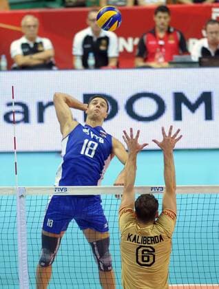MS 2014 Germany vs Russia FIVB Volleyball Men s World Championship Poland 2014. Germany vs. Russia on September 13, 2014 in Katowice, Poland. In the picture: 18 Pavel Moroz 6 Denys Kaliberda  EN_01145166_0004