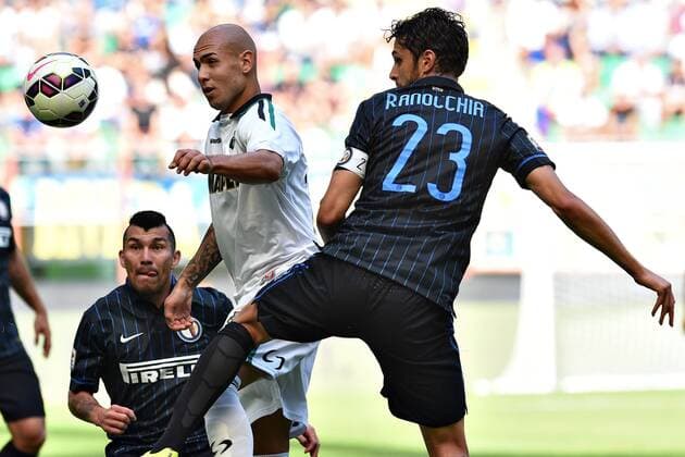 Mg Milano 14 09 2014 - serie A Inter Milan vs Sassuolo Calcio foto MatteoxGribaudi Image Sport Pictured: Simone Zaza-Andrea Ranocchia 